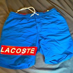 Blue and red Lacoste shorts